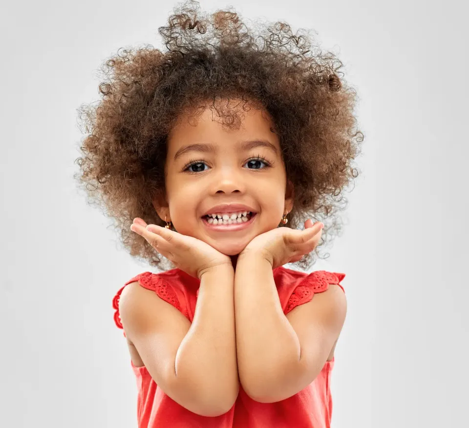 A child smiling during a dental visit at Bristol Dental Clinic